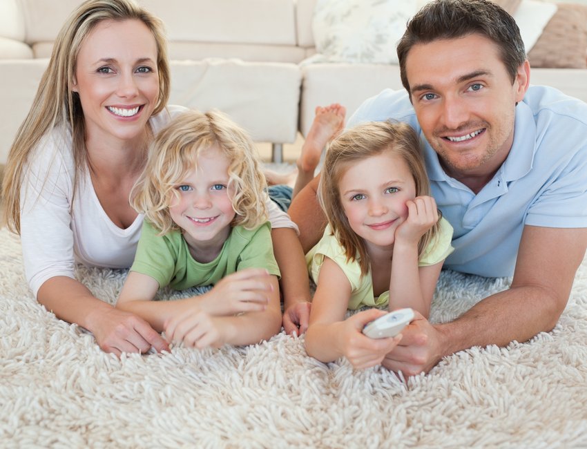 family watching tv floor copia