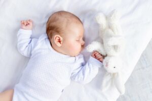 healthy sleep newborn baby crib bedroom with soft toy his hand cotton bed copia